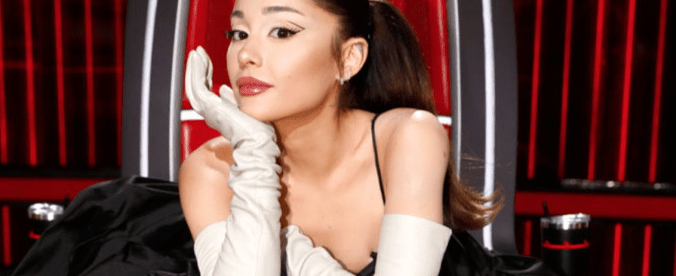 Ariana Grande poses on Big Red Chair on The Voice.