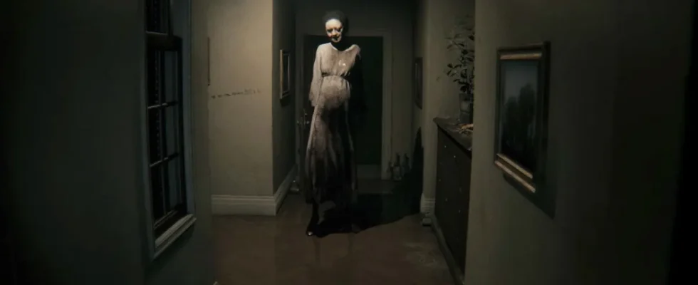 P.T.: Lisa standing creepily at the end of a creepy hallway.