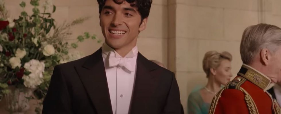 Alex smiling in a tuxedo at the royal wedding