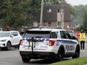 La police d'Ottawa sur les lieux de la mort par balle de Zachary Tiglik en juin 2023.