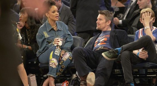 Ethan Hawke flirting with Rihanna at a basketball game