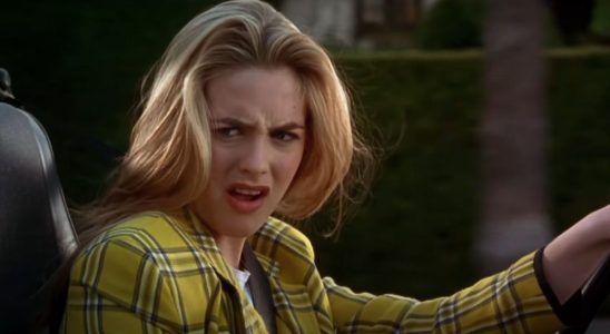 Alicia Silverstone looks disgusted behind the wheel in Clueless.