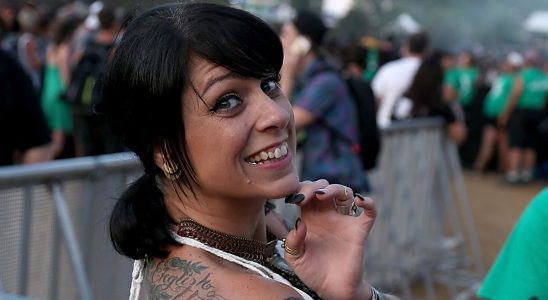 Danielle Colby in a white dress at Lollapalooza in Chicago.