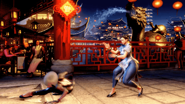 Un GIF animé d'AKI glissant sur le dos vers Chun-Li, qui recule, de Street Fighter 6