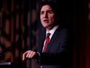 Le premier ministre Justin Trudeau prend la parole lors de la fête du caucus national libéral à Ottawa, le 14 décembre 2022.