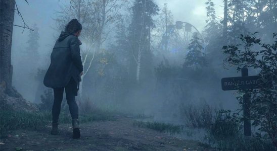Saga Anderson walking in the forest in Alan Wake 2