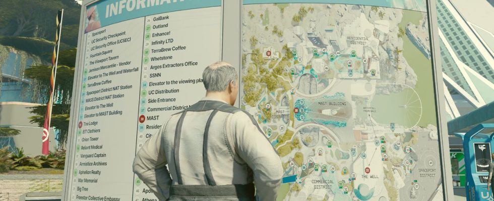 A person looking at a map in a city
