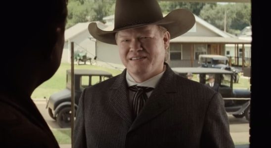 Jesse Plemons wearing a cowboy hat as Tom White in Killers of the Flower Moon
