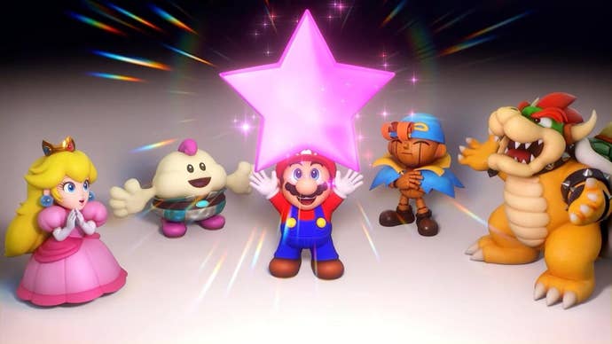 Peach, Bowser, Mario et d'autres se tiennent en demi-cercle, tenant une étoile au-dessus de leur tête.