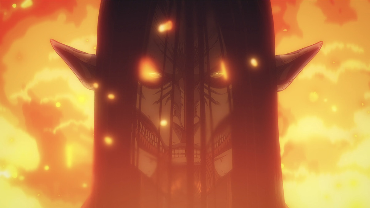 Une photo d'un Eren Titan passant devant le feu