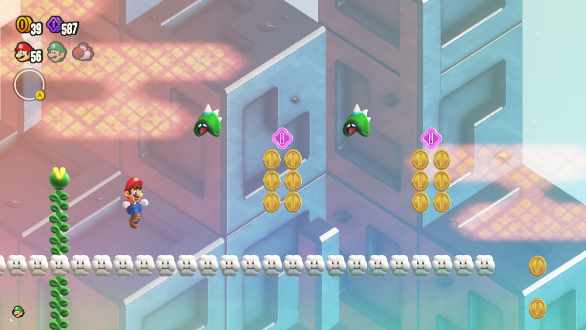 Mario saute vers le haut, tout comme deux Hoppycats, dans une capture d'écran de Super Mario Bros. Wonder