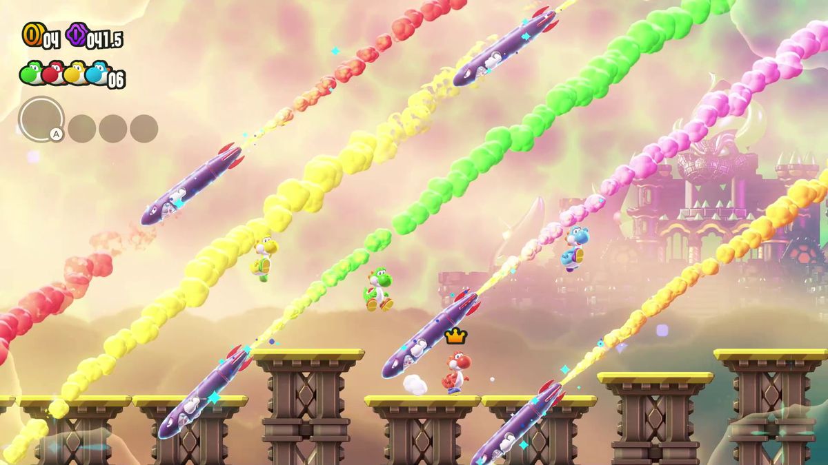Un quatuor de Yoshi évite les tirs de missiles diagonaux entrants Meg dans une capture d'écran de Super Mario Bros. Wonder
