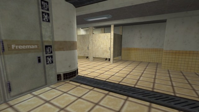Half-Life : des paires de pieds sont visibles sous les toilettes du vestiaire.