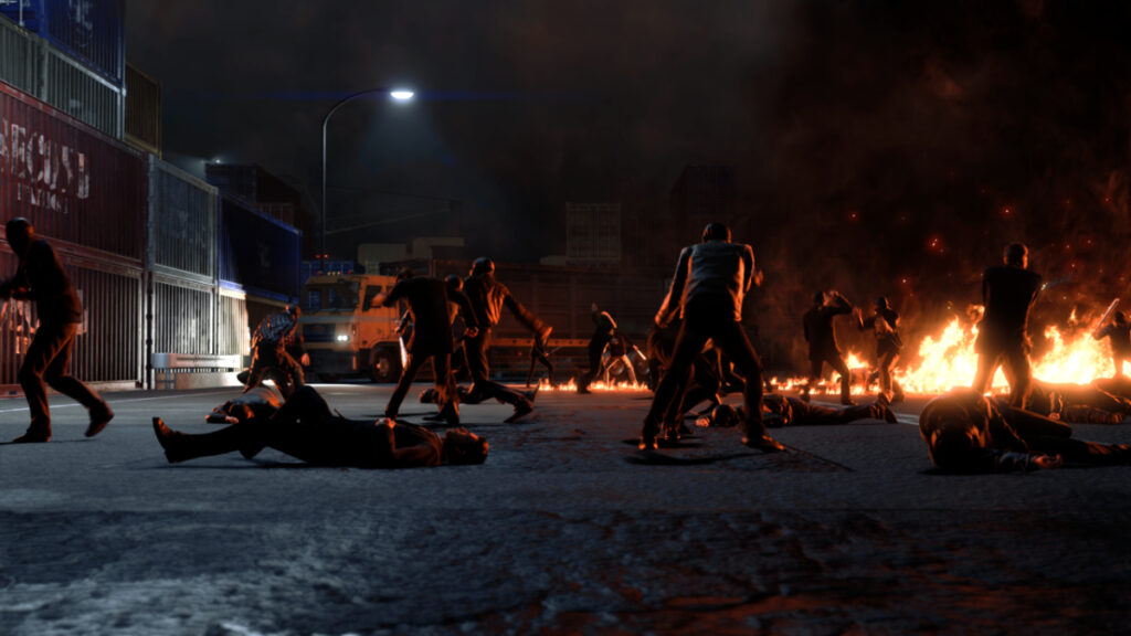 Des gangsters se battent dans une rue en feu dans le nouveau jeu Yakuza