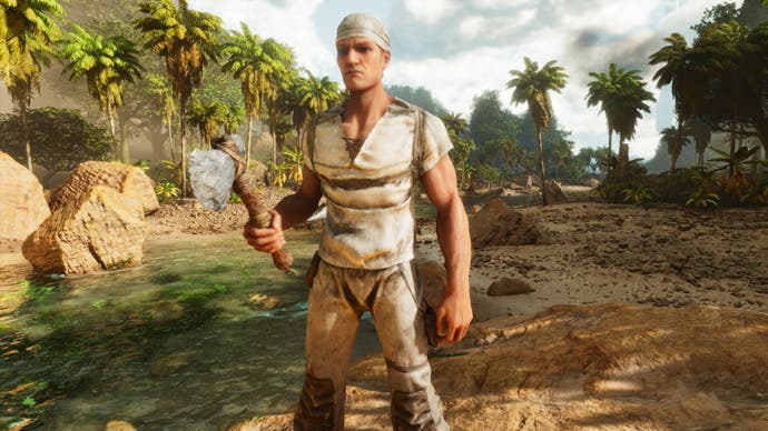 Une capture d'écran de Ark: Survival Ascended montrant le personnage du joueur se tenant sur un rocher au milieu d'une rivière, face à la caméra avec une hache à la main.