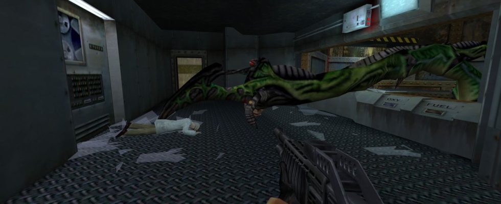 The Half-Life tentacle monster smashes through the window of the Blast Pit control room