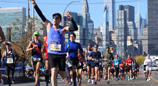 Participants run during the TCS New York City Marathon in New York City, United States on November 07, 2021