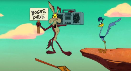 Wile E. Coyote about to plummet, while holding a sign and a boombox,