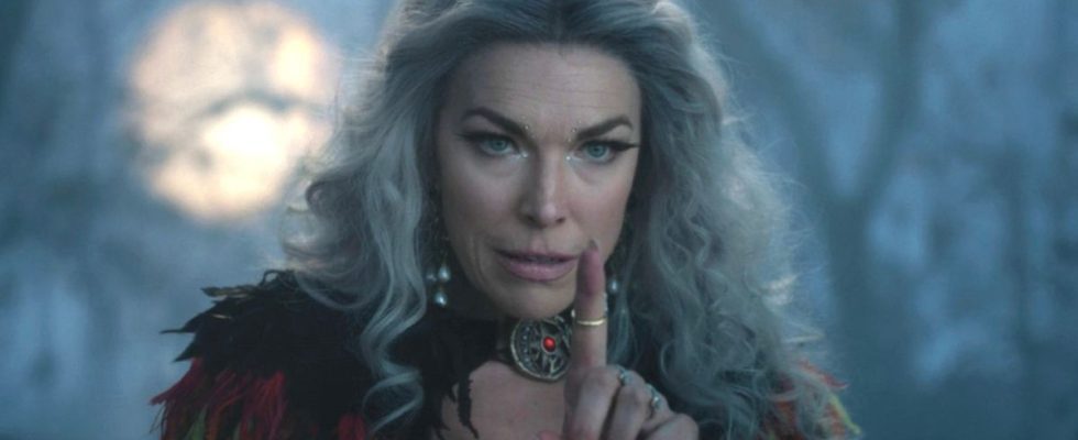 Hannah Waddingham holds a finger up in warning in Hocus Pocus 2.