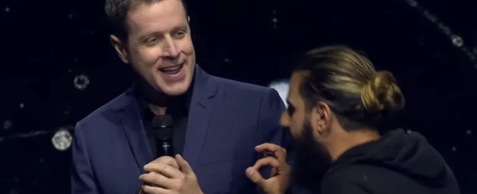 Geoff Keighley is interrupted by a stage crasher during Opening Night Live 2023.