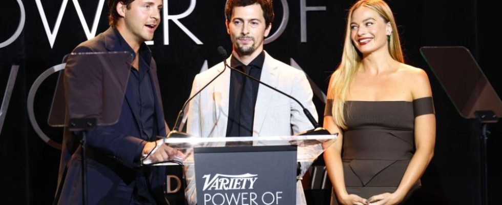 LOS ANGELES, CALIFORNIA - NOVEMBER 16: (L-R) Honorees Tom Ackerley, Josey McNamara, and Margot Robbie speak onstage during Variety Power of Women Los Angeles presented by Lifetime at Mother Wolf on November 16, 2023 in Los Angeles, California. (Photo by Joe Scarnici/Variety via Getty Images)