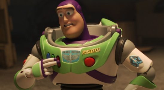 Buzz Lightyear pressing a button on his suit in Toy Story 4.
