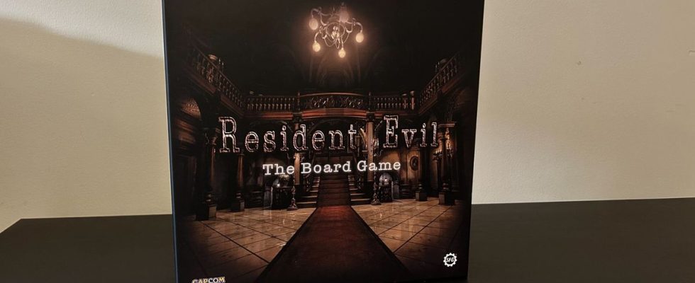 Resident Evil: The Board Game box on a black table with a white background