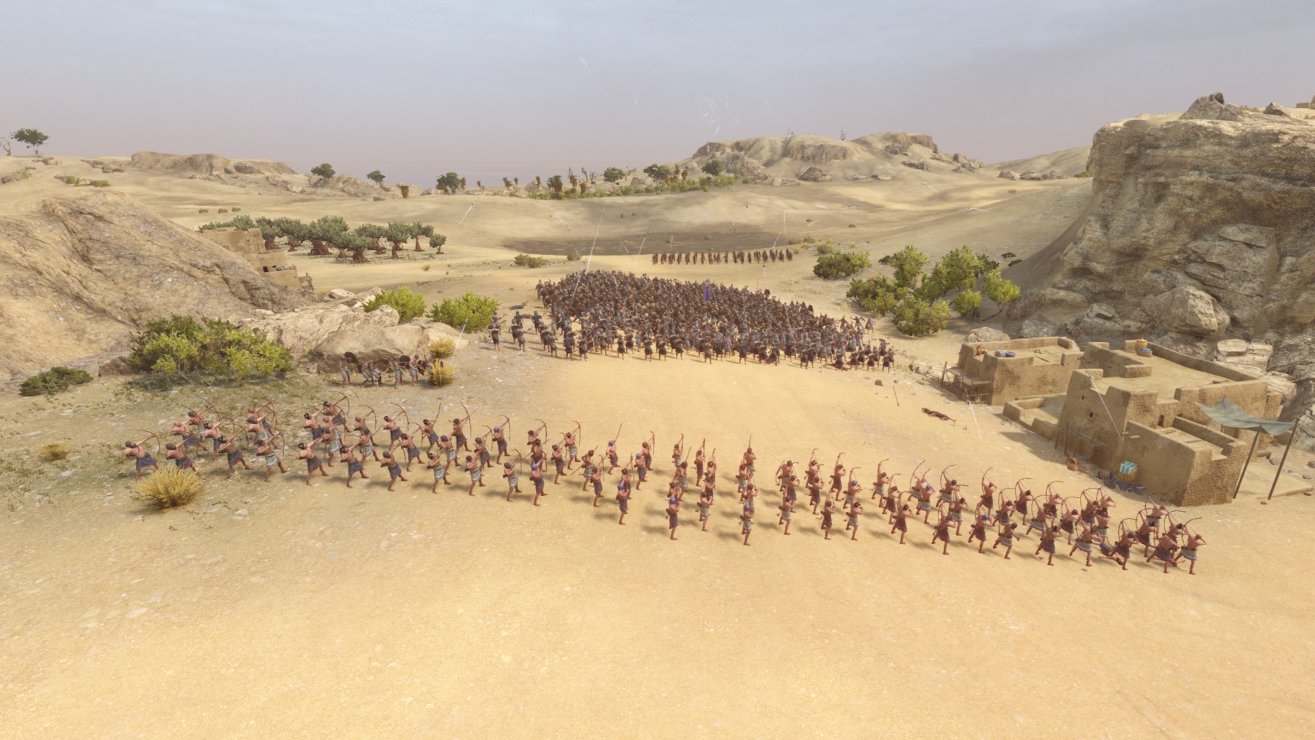Revue de Total War Pharaoh : des archers défendant une colonie.