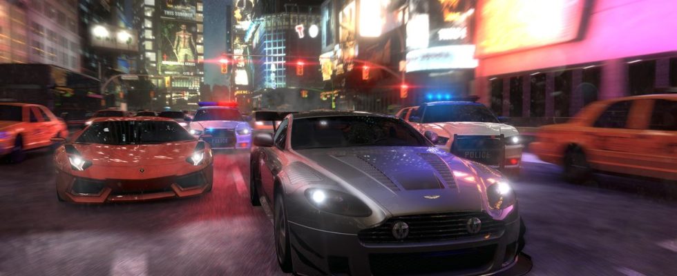 The Crew screenshot - sportscars racing through a nighttime city street