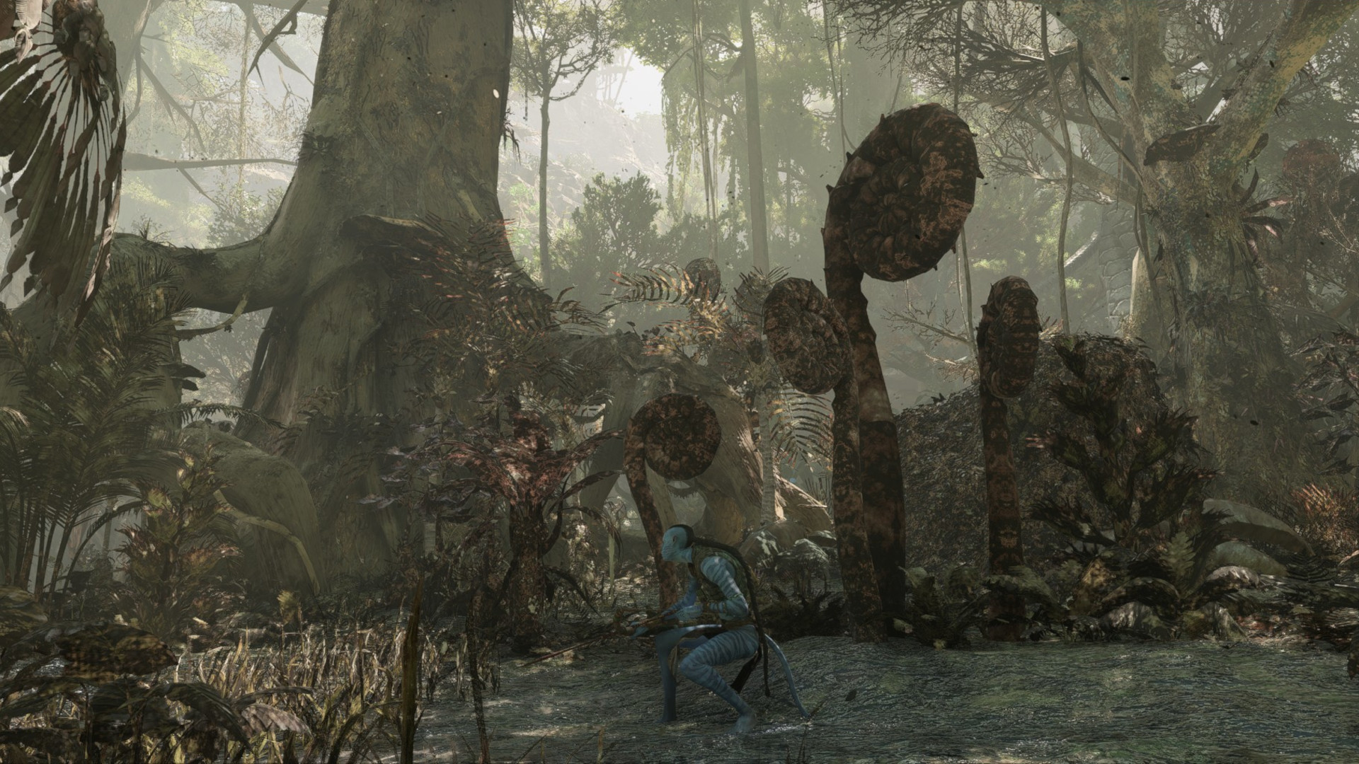 Revue Avatar Frontiers of Pandora : Une forêt drainée et grise subissant l'impact de l'exploitation minière RDA.