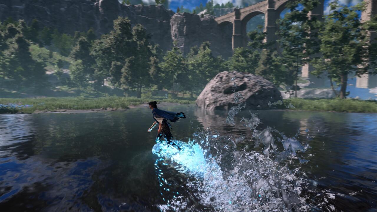 Frey surfe sur un lac avec la magie de l'eau.