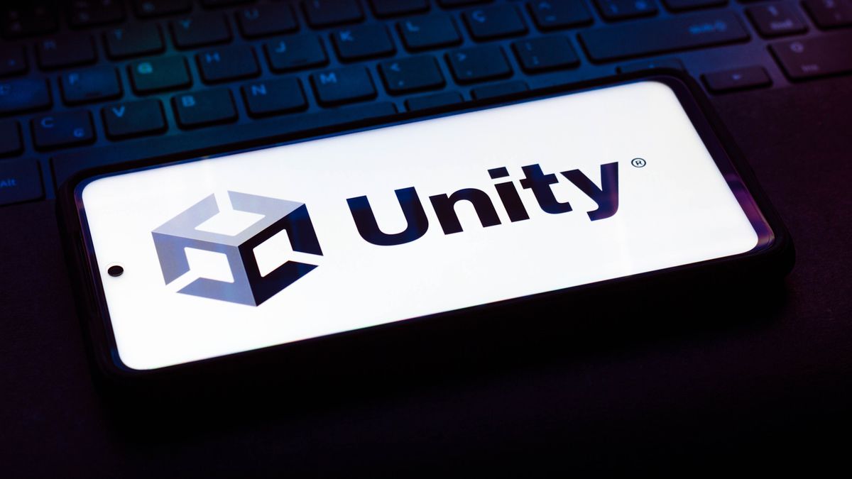 Sur cette photo, le logo Unity Technologies est visible sur le clavier d'un ordinateur portable.