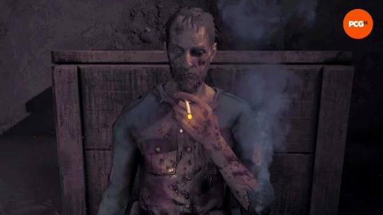 Meilleurs jeux des soldes d'hiver Steam 2023 - Amnesia : The Bunker.  Un homme hagard est assis contre une caisse, tenant une cigarette allumée.