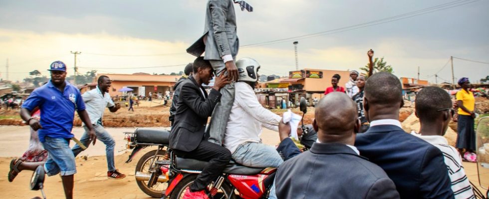 Bobi Wine on Boda boda escaping from Police in Uganda Kampala