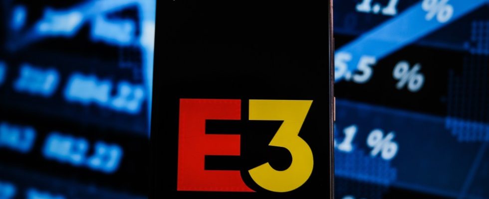 POLAND - 2021/06/15: In this photo illustration an E3 logo displayed on a smartphone with stock market percentages on the background. (Photo Illustration by Omar Marques/SOPA Images/LightRocket via Getty Images)