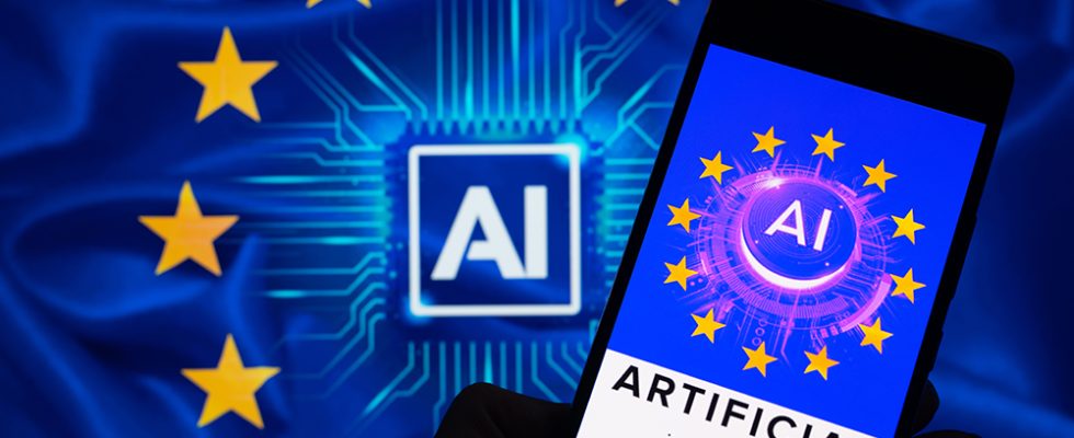 An icon representing Artificial Intelligence is being displayed on a smartphone, with AI and EU stars visible in the background, in this photo illustration. EU policymakers are reaching a political agreement that is poised to become the global benchmark for regulating Artificial Intelligence, in Brussels, Belgium, on December 12, 2023. (Photo by Jonathan Raa/NurPhoto via Getty Images)