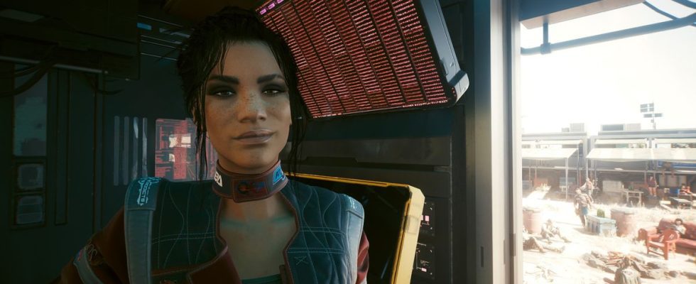 Panam Palmer, a romance option from Cyberpunk 2077, smirks haplessly at the camera.