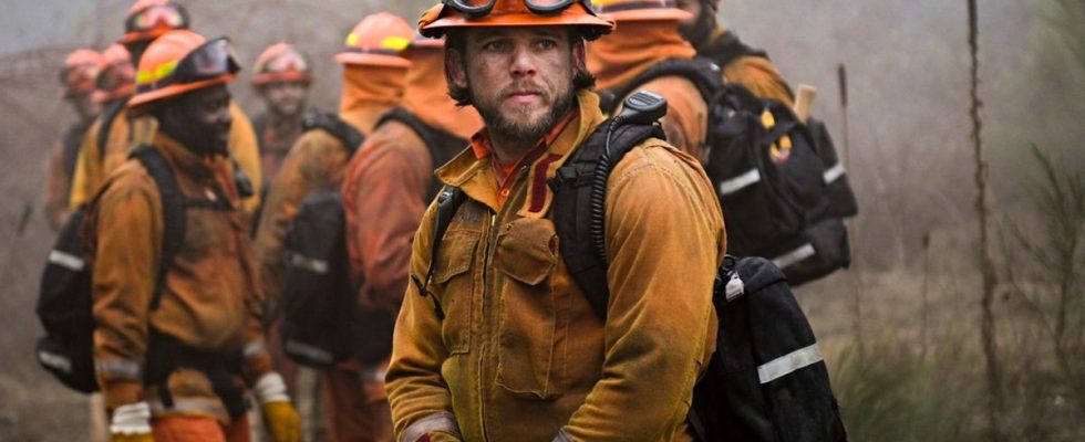 Max Thieriot standing in her fire gear in Episode 16 of Fire Country