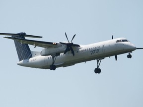 Un vol de Porter Airlines effectue son approche finale alors qu'il atterrit à l'aéroport le mardi 2 juillet 2019 à Ottawa.
