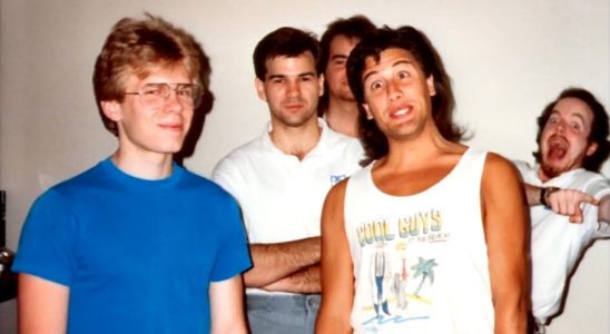An old photo of id Software showing a young John Carmack and John Romero.