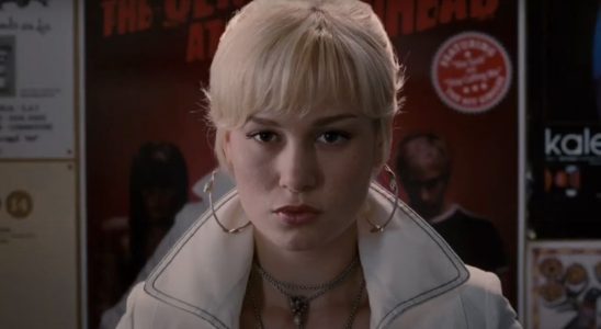 Brie Larson makes an angry face as she stands in front of a poster in Scott Pilgrim vs. The World.