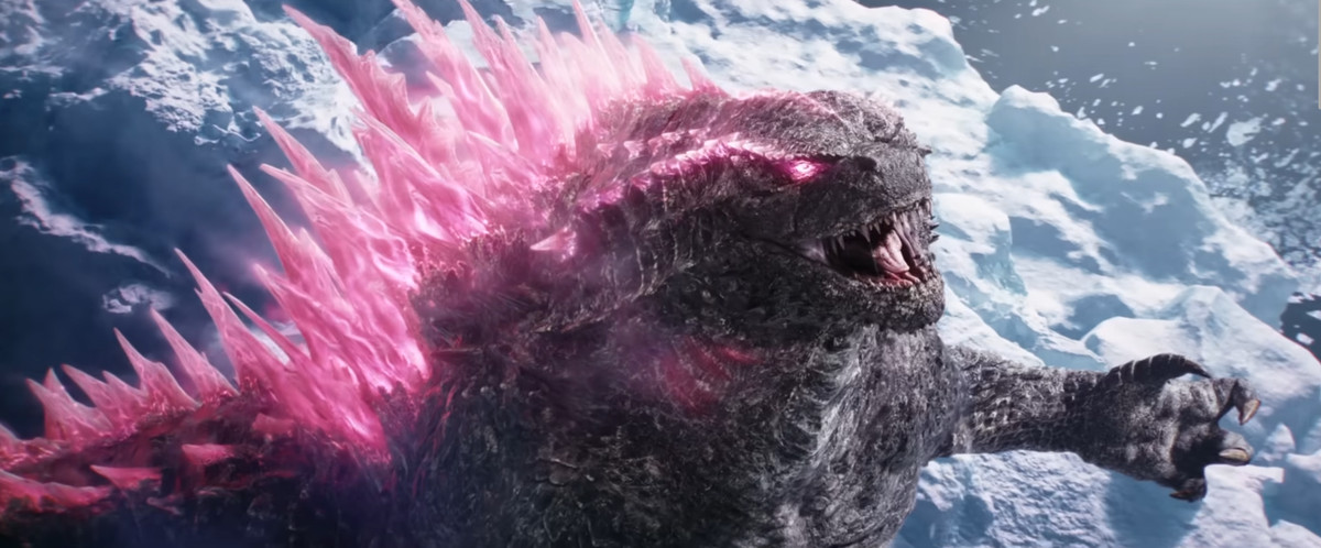Godzilla rugit vers le ciel avec une colonne vertébrale rose dans Godzilla x Kong : The New Empire