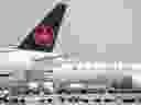 Les avions d'Air Canada sont assis sur le tarmac de l'aéroport international Pearson de Toronto, le mercredi 28 avril 2021. 