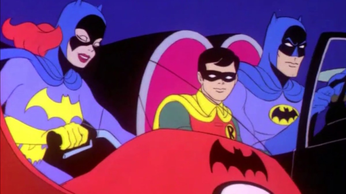 Bruce Wayne, Robin et Batgirl au volant.