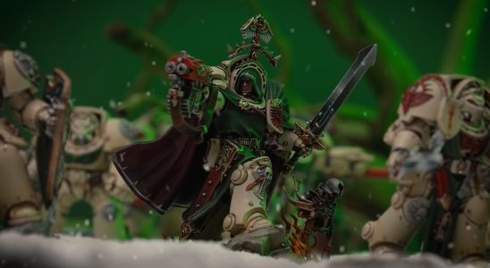 Grand Master Belial aims his bolter in the snow