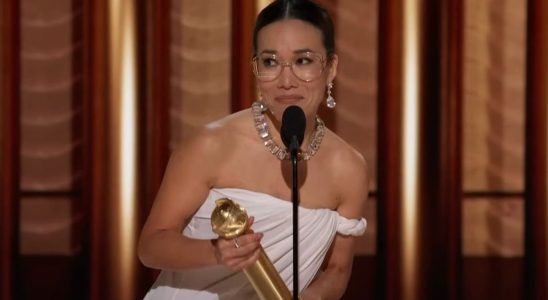 Ali Wong on stage accepting her Golden Globe award