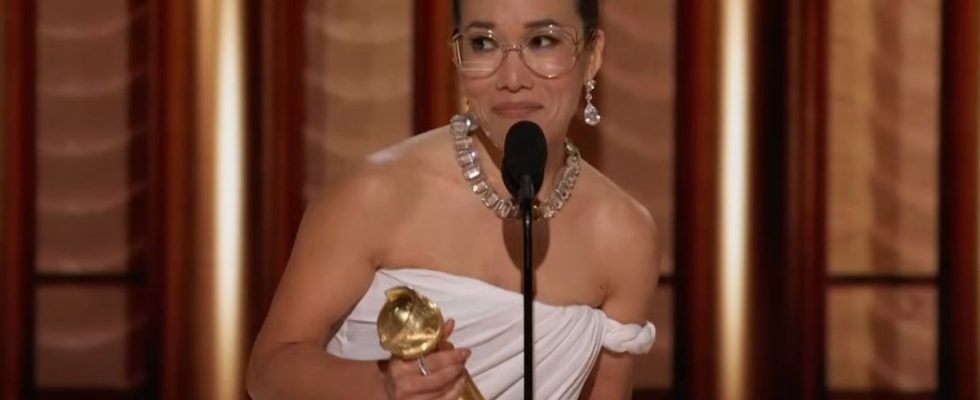 Ali Wong on stage accepting her Golden Globe award