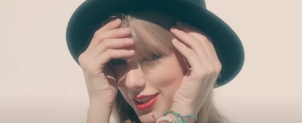 Taylor Swift wearing the 22 hat in the 22 music video.