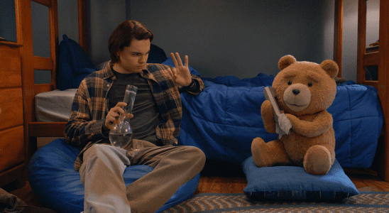 Max Burkholder as John, Seth MacFarlane as voice of Ted in Episode 2