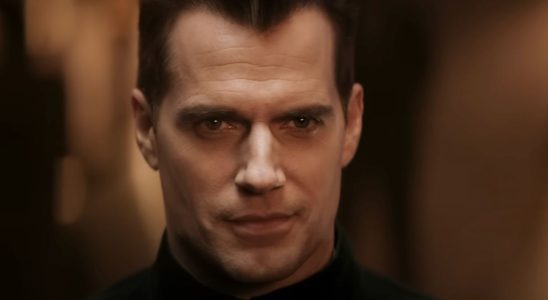 Henry Cavill wearing a smirk on his face in Argylle.